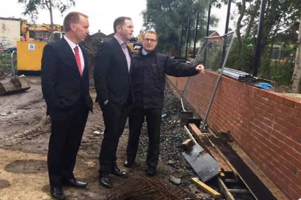 Minister Hazzard views progress along with David Porter and Owen McGivern from Rivers Agency