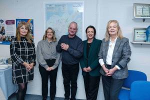 Image of five people including Infrastructure Minister Liz Kimmins.